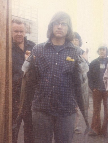 Peter holding up two bonito