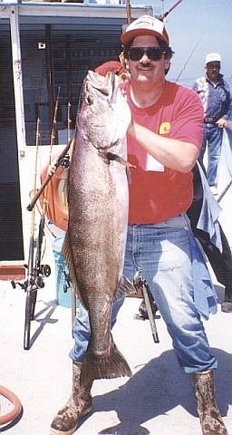 Peter holding a white seabass