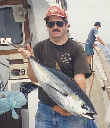 Peter holding a yellowfin tuna