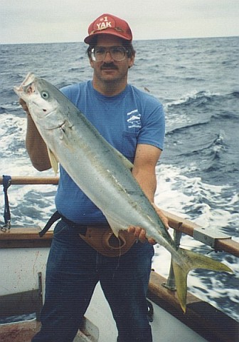 Peter holding a yellowtail